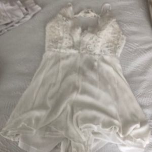 White open back romper size Med
